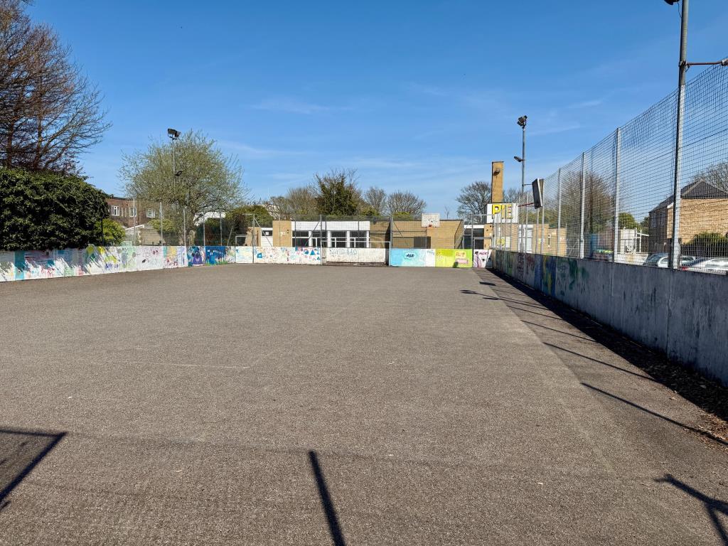 Lot: 32 - TWO SINGLE STOREY BUILDINGS, OPEN AIR SPORTS COURT AND PARKING AREA ON ALMOST AN ACRE PLOT WITH POTENTIAL - Sports court